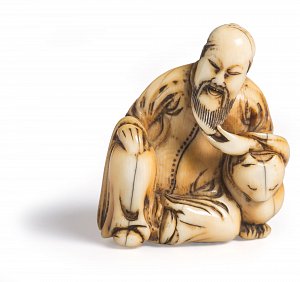 Netsuke représentant un sage appuyé sur son tigre, Japon, début / milieu du XVIIIe siècle